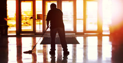 Janitor cleaning a hotel lobby