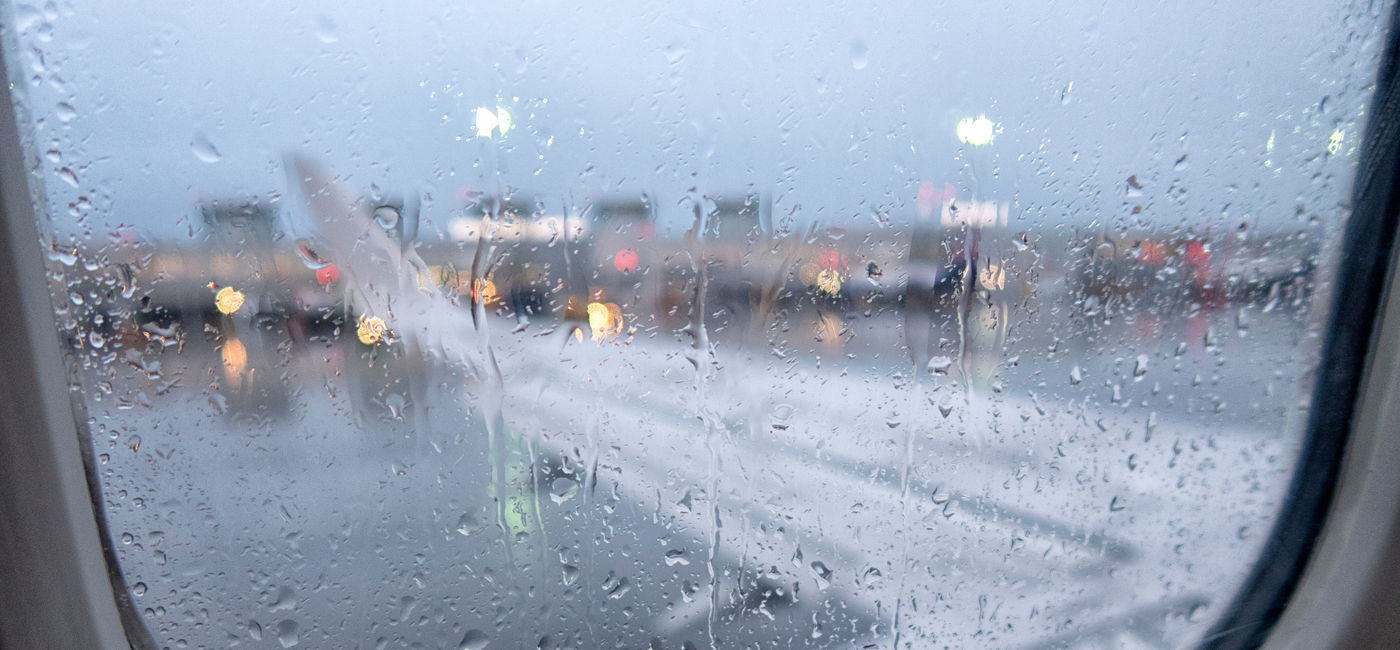 Image: Plane in the rain. (Photo Credit: maxcam / Adobe Stock)