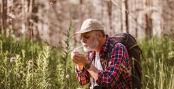 Hiker sparking a joint