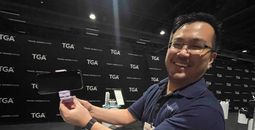 A rep shows off tech device accessories 