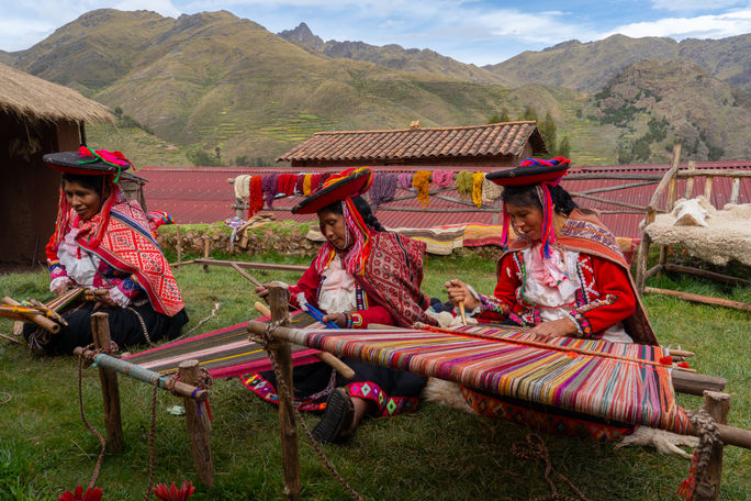 Three local female weavers in Chumbe Community, Sacred Valley, Peru