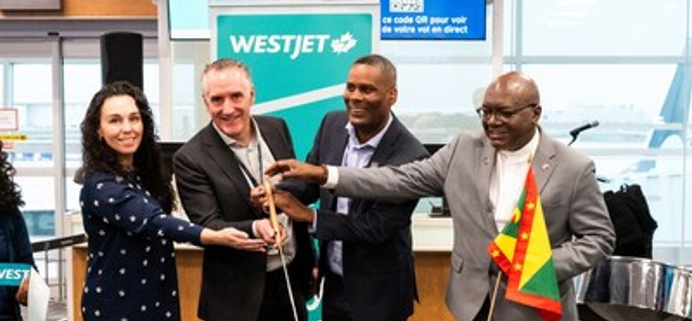 Image: WestJet and Grenada Tourism Authority officials celebrate the airline's new Toronto-Grenada route. (Photo Credit: WestJet)