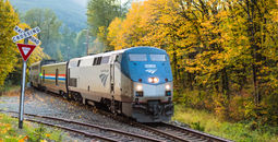 An Amtrak train in autumn.