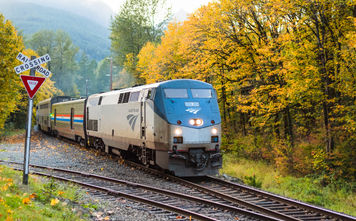 An Amtrak train in autumn.