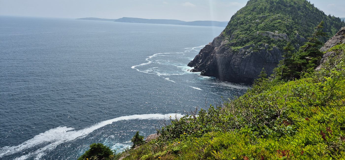 Image: Towering cliffs, crashing waves and panoramic Atlantic vistas from the East Coast Trail. (Photo Credit: Jason Summers)