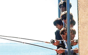 The Beatles fishing out the window of The Edgewater Hotel in Seattle in 1964