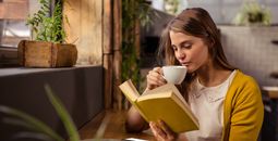 reading, woman reading, solo traveler, book, cafe