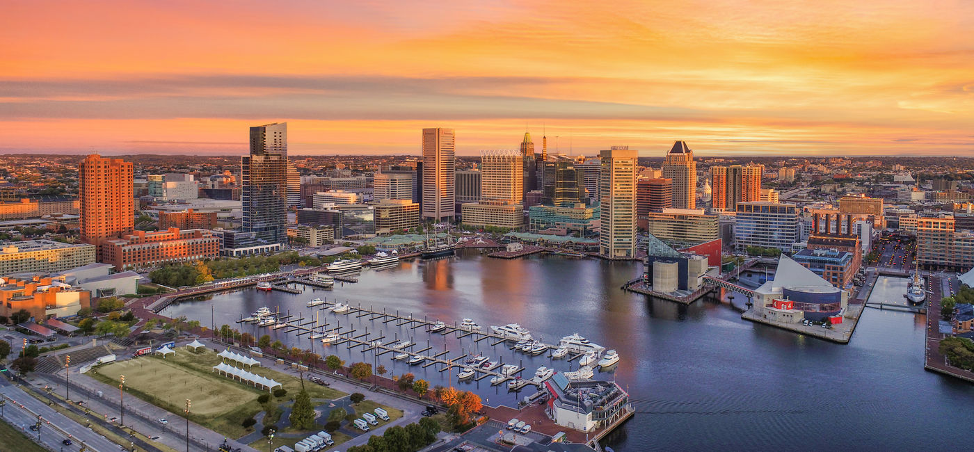 Image: Aerial view of Baltimore, Maryland. (Photo Credit: Kevin Ruck/Adobe)