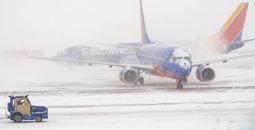 Southwest Airlines taxi on a snowy runway
