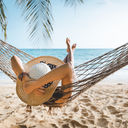 Summer traveler relaxing on the beach