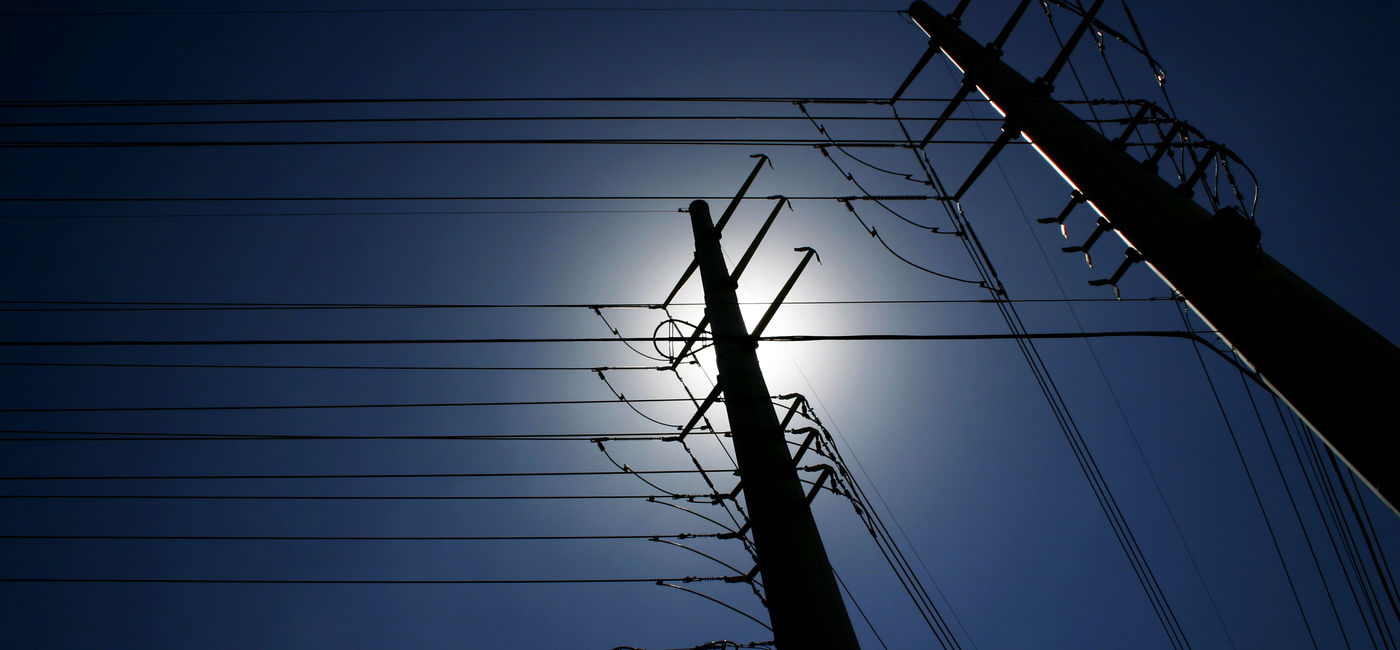 Image: PHOTO: Maze of power lines. (photo via jjgarcia03 / iStock / Getty Images Plus)