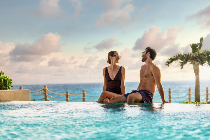 A couple at the pool. A couple at the pool.