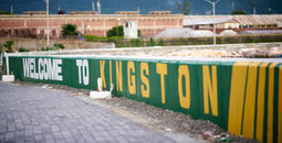 A mural saying "Welcome to Kingston" in Jamaica.