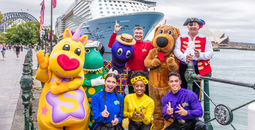 The Wiggles post in front of Ovation of the Seas