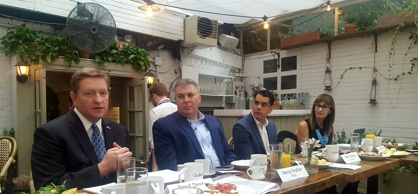 Image: Caption: Brad Dean (left) served as Discover Puerto Rico CEO since its inception in 2018. (Photo by Brian Major)