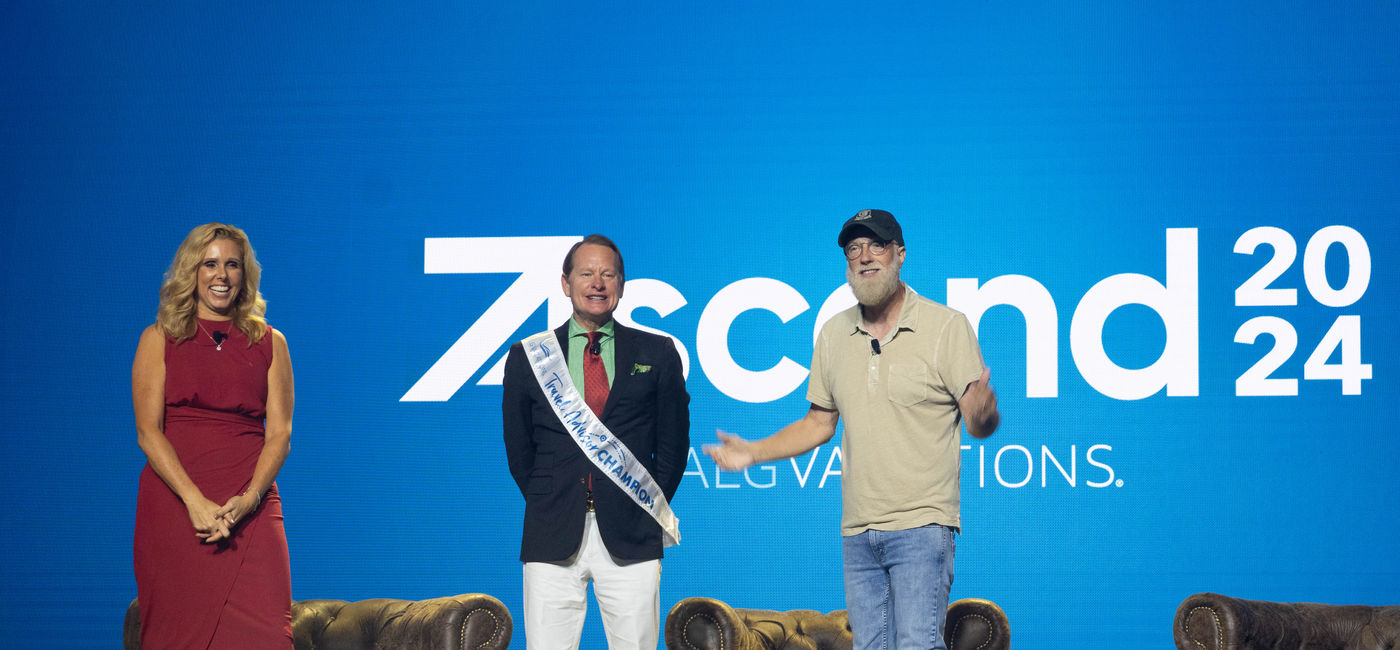 Image: Jacki Marks and Carson Kressley on stage with Chris Elliott during Ascend 2024. (Photo Credit: ALG Vacations)