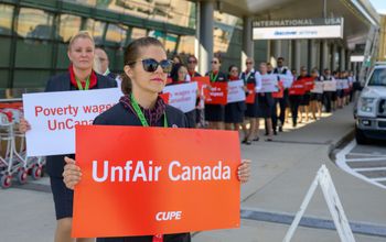 Air Canada crew members picketing as part of CUPE's current strike.