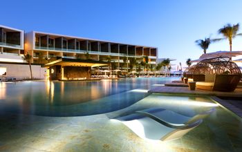 TRS Coral Hotel pool at night. 