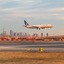 United Airlines jet landing at Newark Liberty International Airport.