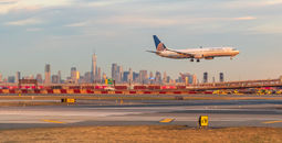 United Airlines jet landing at Newark Liberty International Airport.