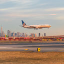 United Airlines jet landing at Newark Liberty International Airport.