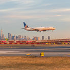 United Airlines jet landing at Newark Liberty International Airport.