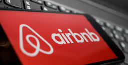 Red airbnb logo.