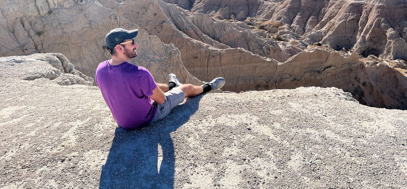 Image: The author enjoying the South Dakota Badlands. (photo by Kim Banocy)