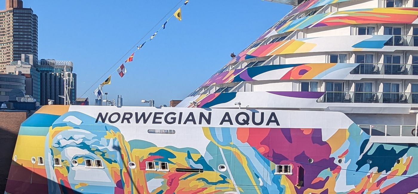 Image: Norwegian Aqua docked in New York Citys cruise port. (Photo Credit: Claudette Covey)