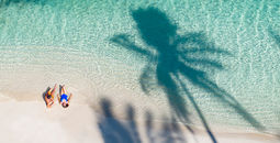 A couple at a lagoon on Moorea