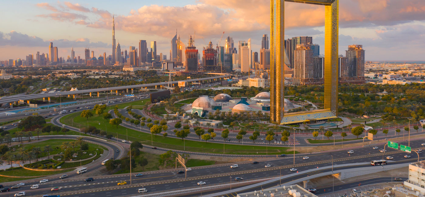 Image: Dubai Frame looks over old and new Dubai. (Photo Credit: tampatra/Adobe Stock)