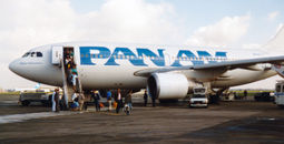 Travelers deplane a Pan Am flight from New York to Brussels in 1989