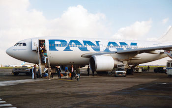 Travelers deplane a Pan Am flight from New York to Brussels in 1989