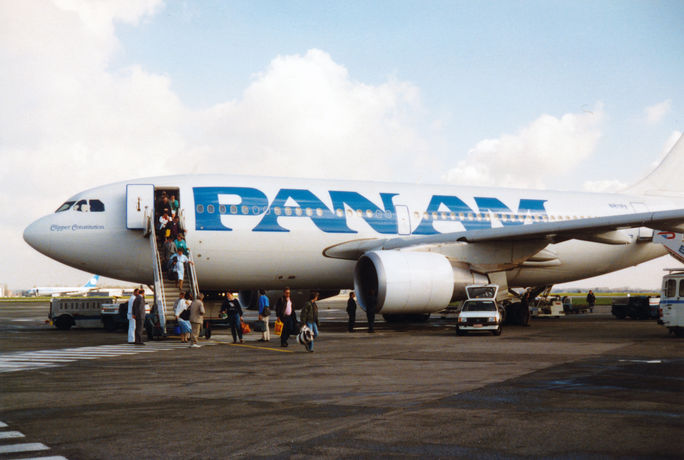 Travelers deplane a Pan Am flight from New York to Brussels in 1989 Travelers deplane a Pan Am flight from New York to Brussels in 1989