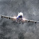 Passenger airplane flying through a storm.