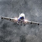 Passenger airplane flying through a storm.