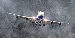 Passenger airplane flying through a storm.