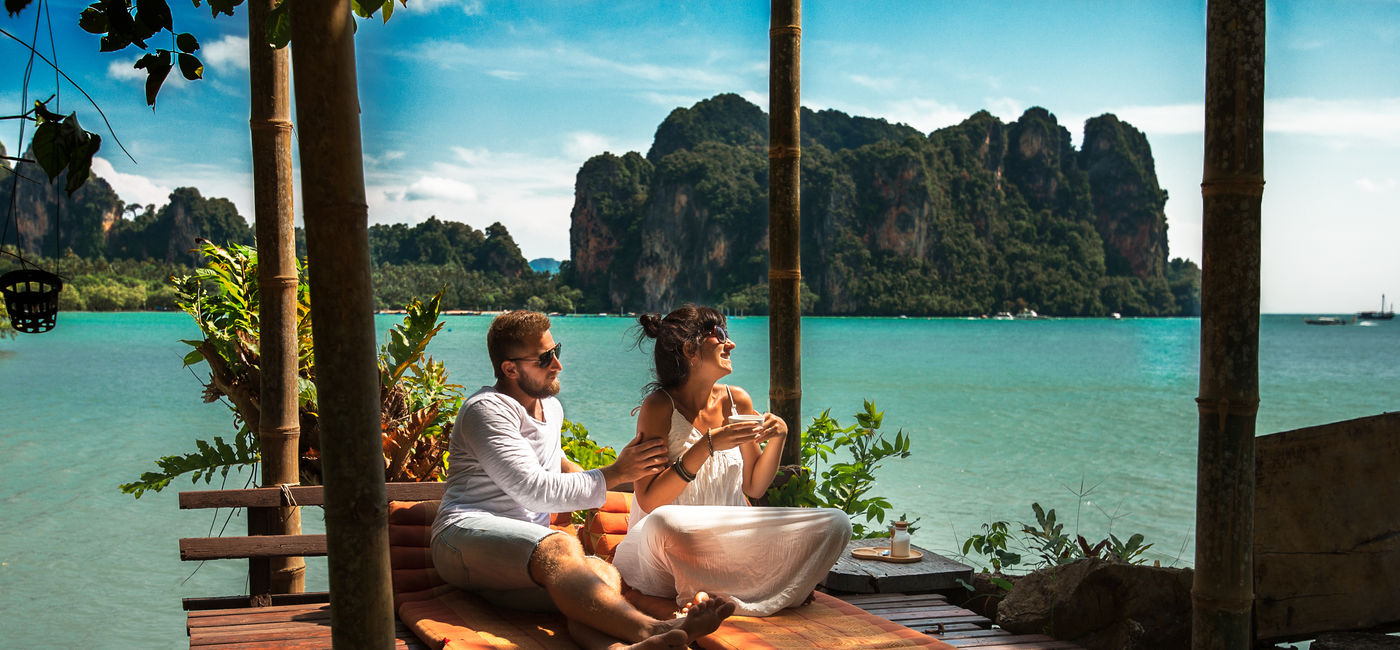 Image: Couple enjoying a luxury vacation in Thailand. (Photo Credit: MISHA/Adobe)