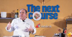 Chief Culinary Officer Emeril Lagasse puts on a cooking demo showcasing one of Carnival's culinary creations