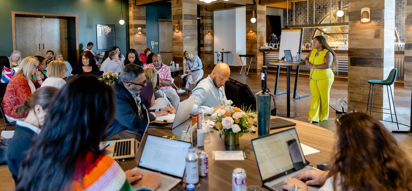 Image: 2025's The Biz Huddle meeting. (Photo Credit: Brio Photography)