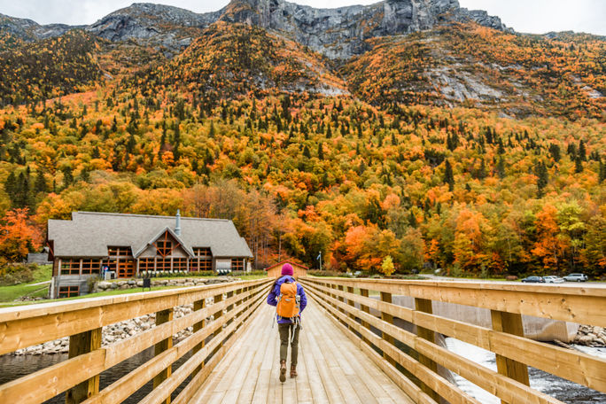 Autumn nature hiker walking in national park in Quebec