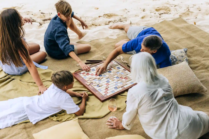 Family playing a game on vacation