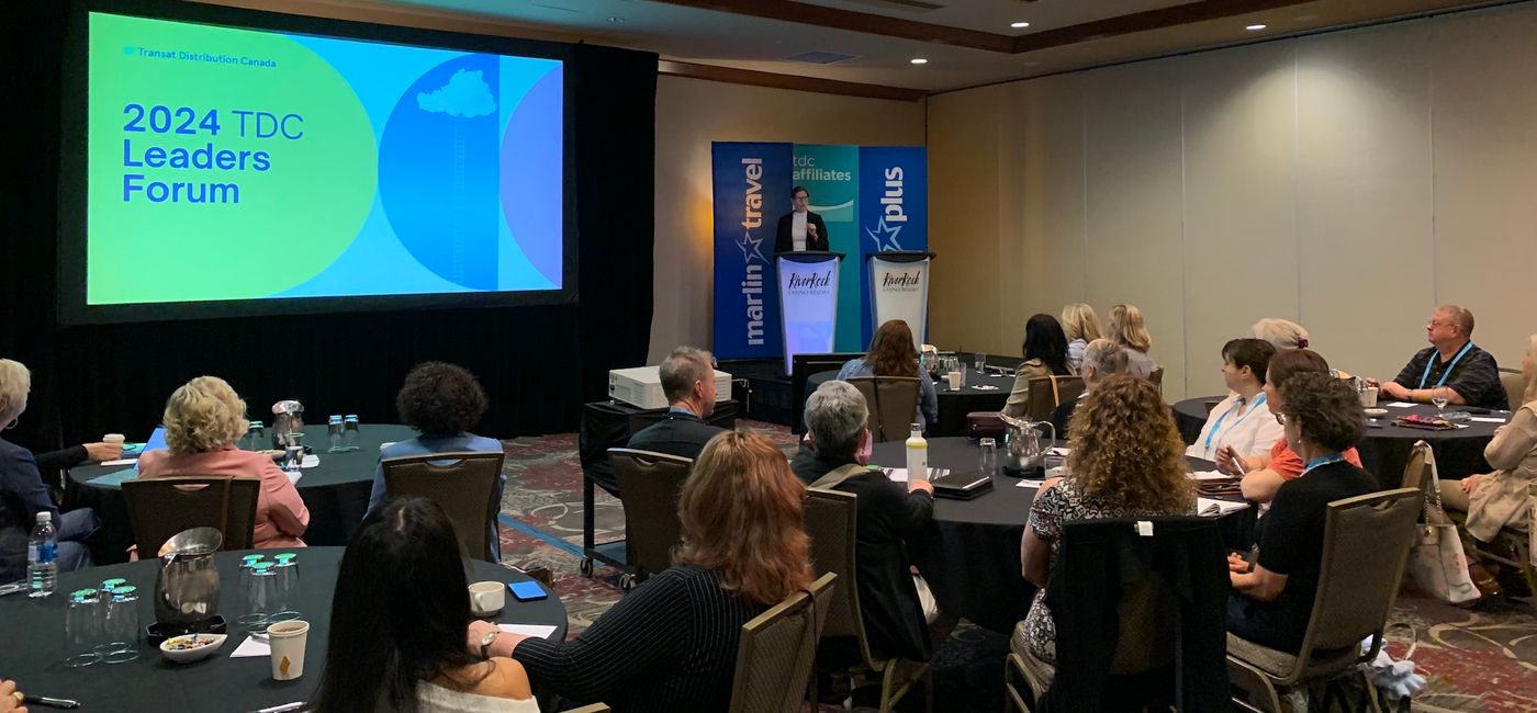 Image: TDC General Manager Karine Gagnon addresses the 2024 TDC Leaders Forum. (Photo Credit: Transat Distribution Canada)