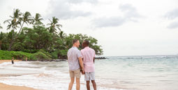 Queer couple on beach