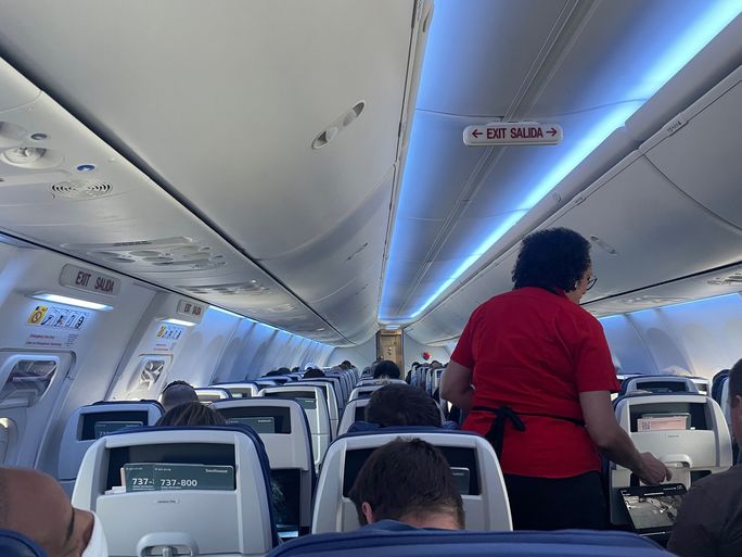 Southwest Airlines, cabin, flight attendant, southwest cabin, southwest flight attendant, plane cabin