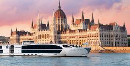 Uniworld Boutique River Cruises' S.S. Maria Theresa sails past the Hungarian Parliament Building in Budapest, Hungary.