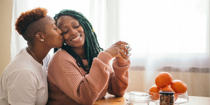 Couple kissing at home Couple kissing at home