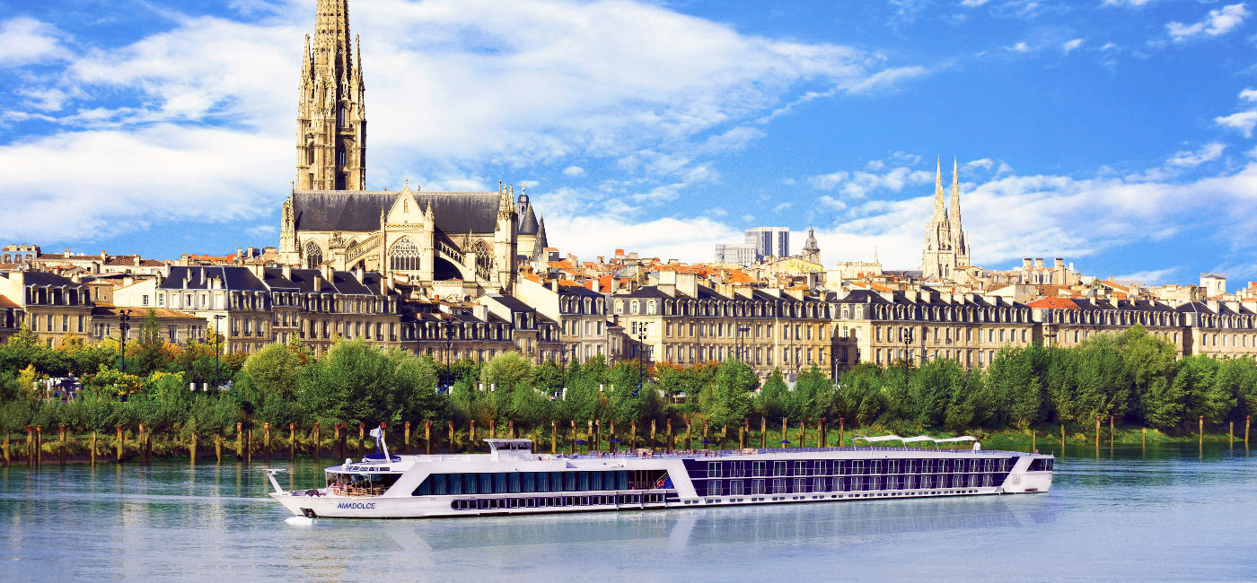 Image: The AmaDolce sails along the river in Bordeaux, France.  (Photo Credit: AmaWaterways)