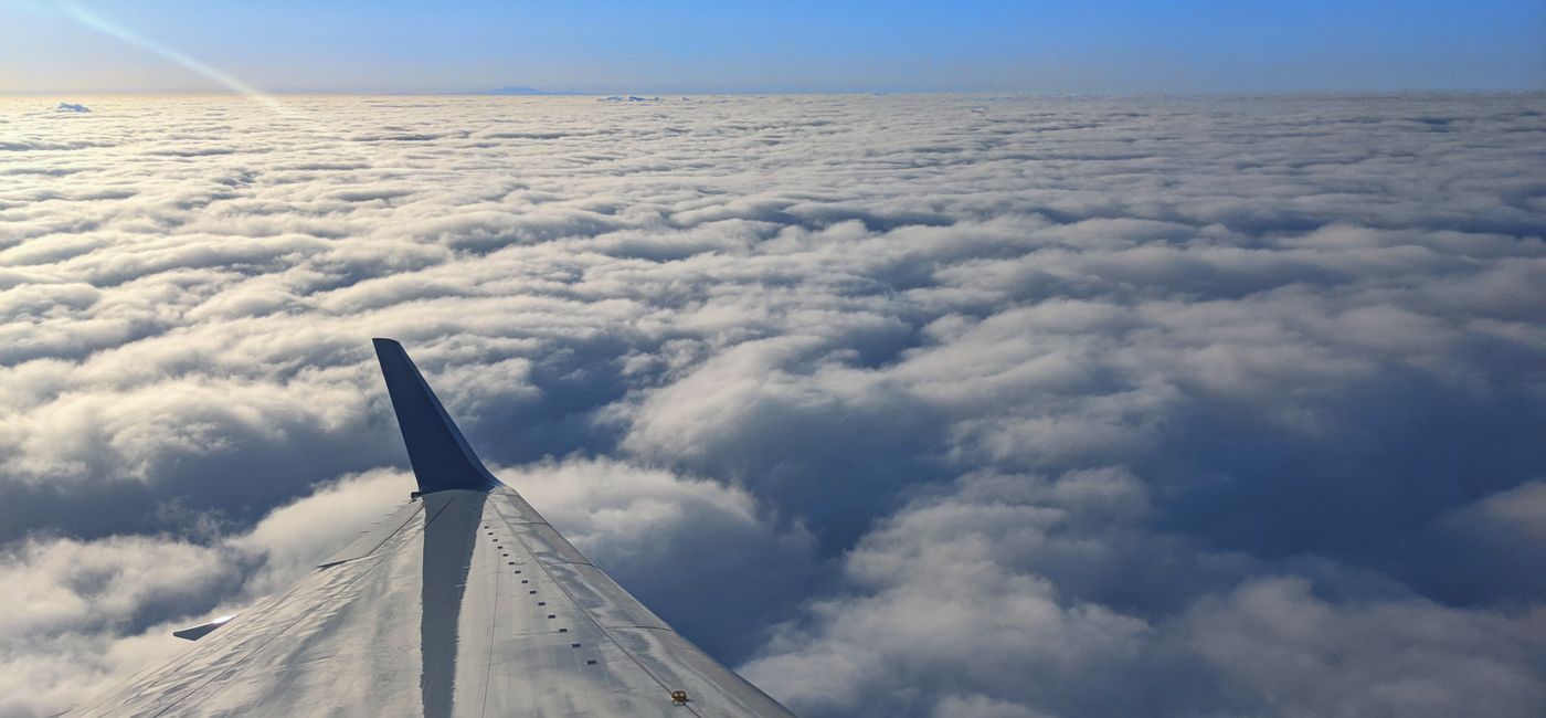 Image: Window seat views while flying on an airplane (photo by Lauren Bowman)
