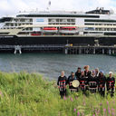 Alutiiq dancers welcome MS Roald Amundsen to Old Harbor, Alaska